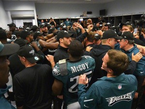 The Eagles celebrate their NFC East championship Sunday night in Dallas. 