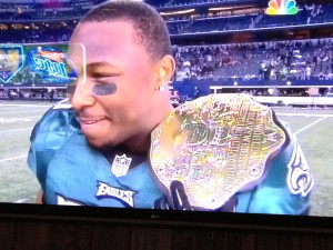 McCoy flaunts his title belt, which represented many things after the Eagles won in Dallas Sunday night. 