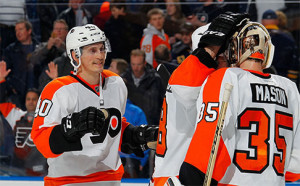 Vinny Lecavalier (left) celebrates game-winning goal Tuesday night in Buffalo. 