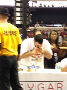 Dave Brunelli, aka Tiger Wings N Things, chomps down during round two of Wing Bowl 22 at the Wells Fargo Center. - photo by Joe Darrah