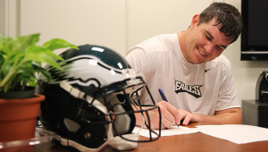 Eagles rookie Taylor Hart signs first NFL contract. Photo credit - PhiladelphiaEagles.com
